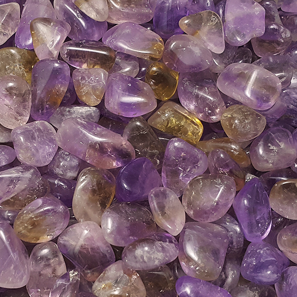 Polished ametrine crystal showing a sharp division between violet-purple and golden-yellow zones