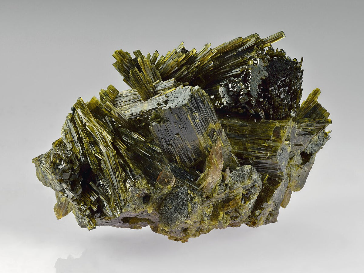 Dark green Epidote crystal cluster with elongated prismatic forms