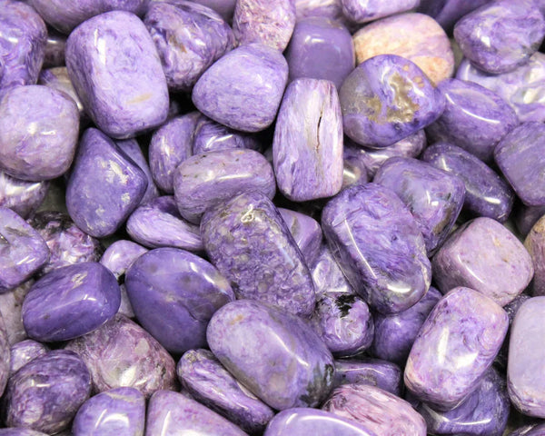 Swirling purple Charoite crystal with silky violet marbling and natural patterns