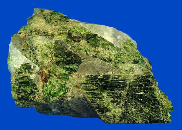 Vivid green Chrome Diopside crystal specimen with quartz