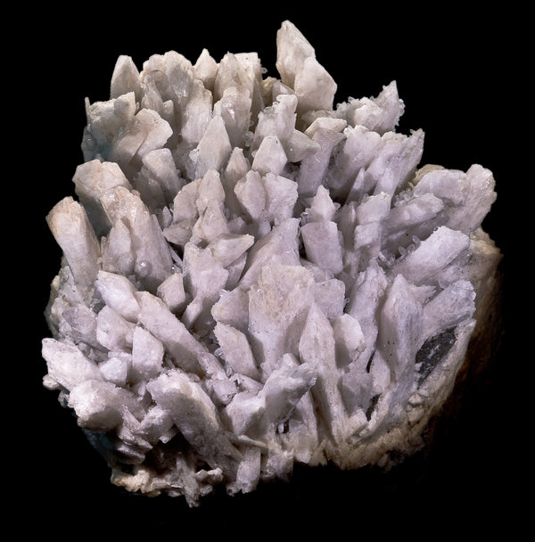Clear elongated Danburite crystal with glassy luster