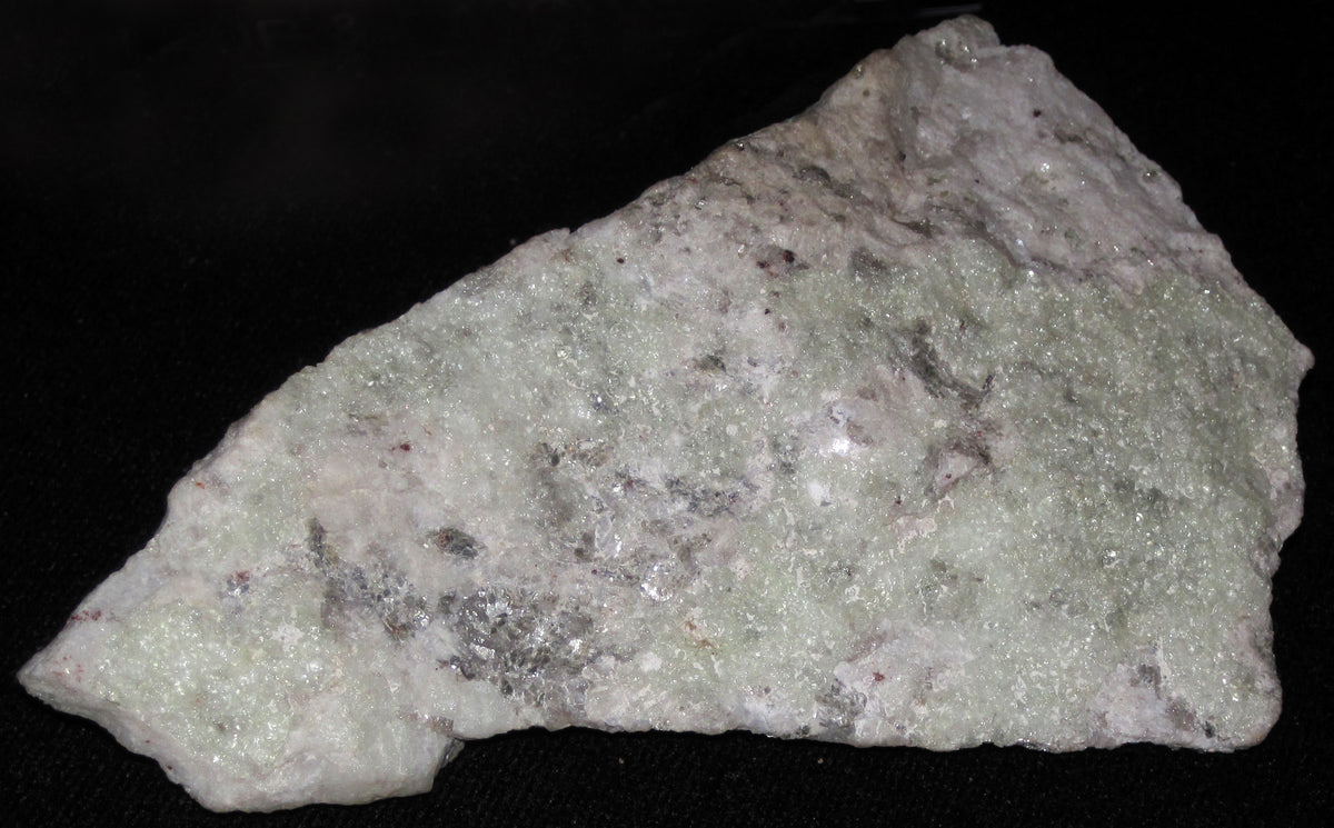 Clear glassy Hyalite Opal with botryoidal crust formation