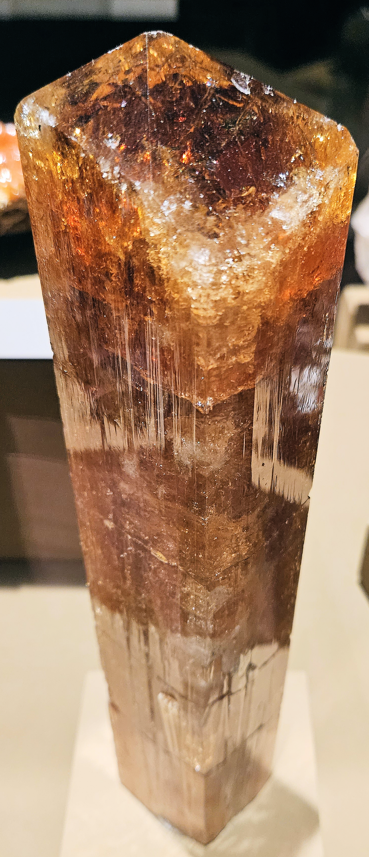Golden-orange Imperial Topaz crystal with rich warm color