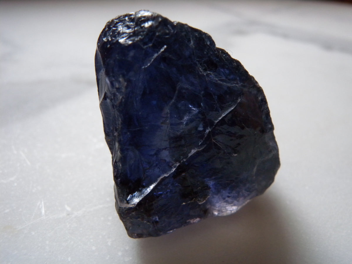 Violet-blue Iolite crystal showing its characteristic pleochroic color