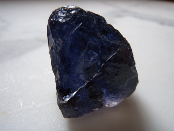 Violet-blue Iolite crystal showing its characteristic pleochroic color