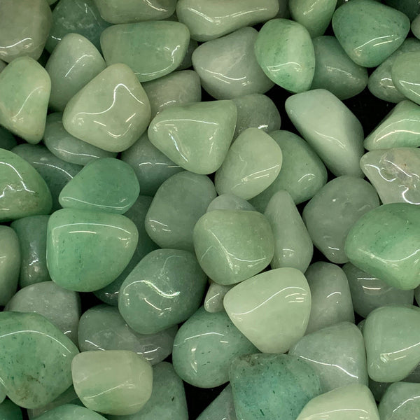 Polished Green Aventurine crystal with sparkling green shimmer and rounded edges.