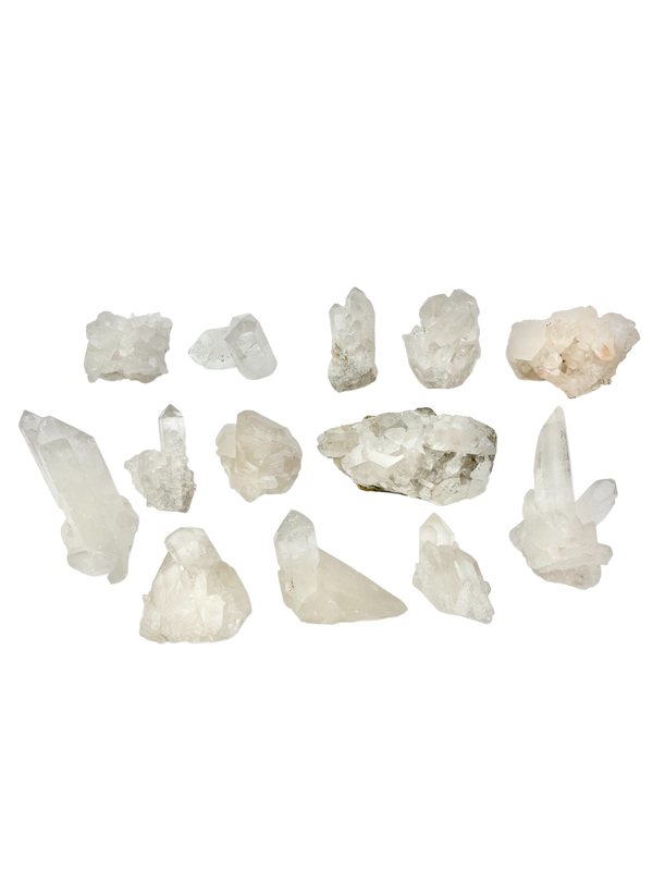 A luminous Clear Quartz crystal cluster radiating pure light energy.