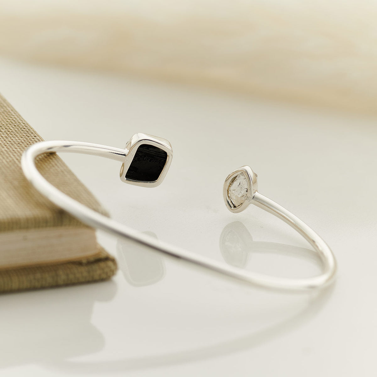 Back of black tourmaline and Herkimer diamond cuff bracelet in sterling silver