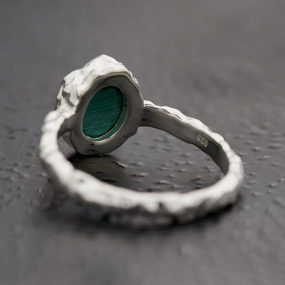 Back of oval malachite ring in hammered sterling silver