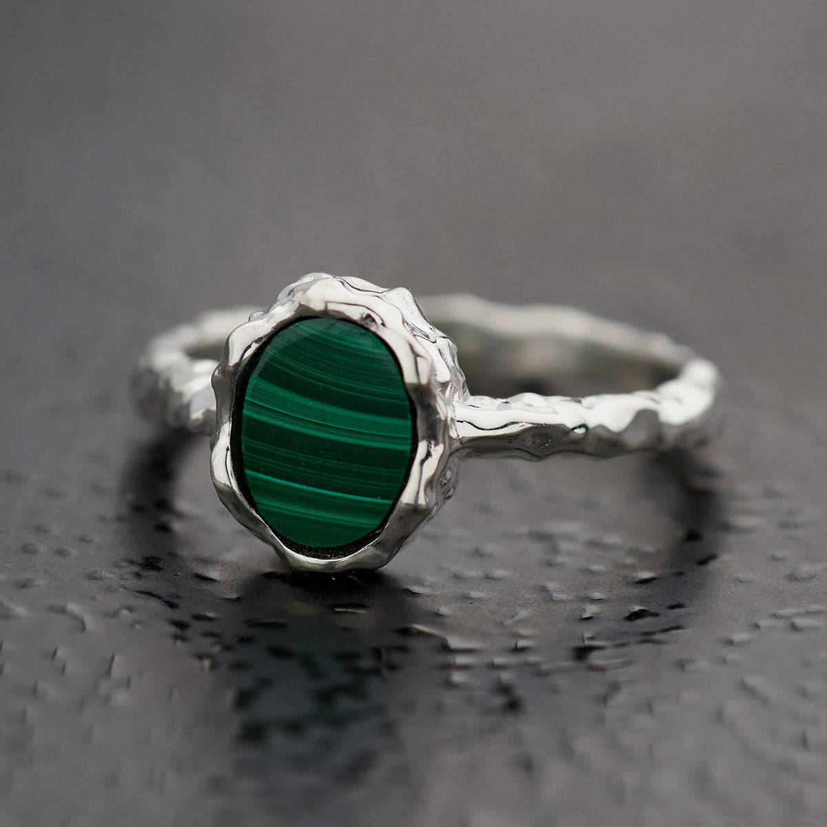 Oval malachite ring in hammered sterling silver