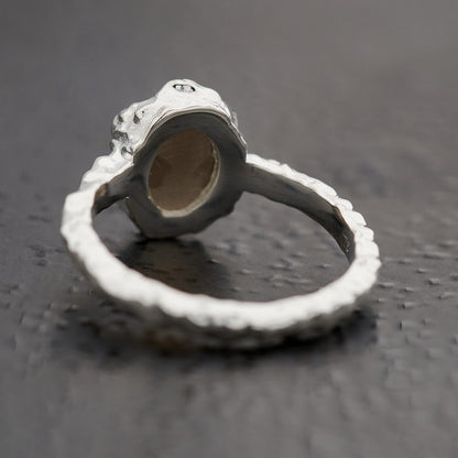Back of oval smoky quartz ring in hammered sterling silver