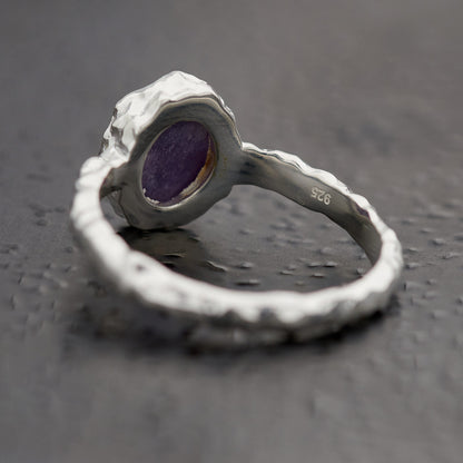Back of oval lepidolite ring in hammered sterling silver