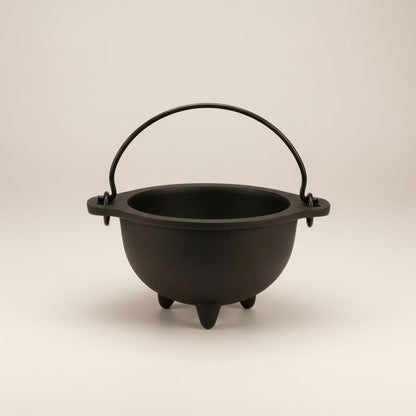 Small black cast iron cauldron with handle, 2.5 in inside diameter