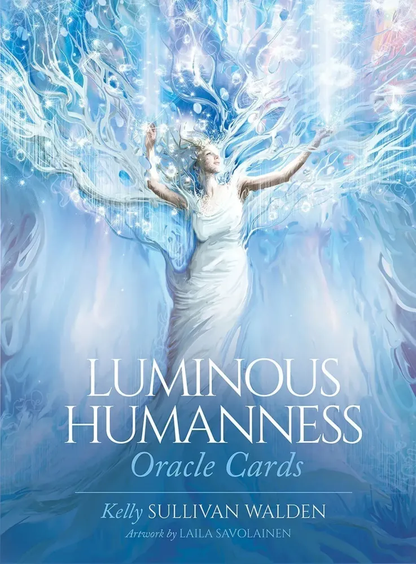 Cover of “Luminous Humanness Oracle Cards” showing an ethereal figure in a flowing white dress with arms raised, merging into radiant, tree-like branches of light against a soft blue, luminous background, evoking spiritual awakening and human connection.