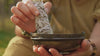 Sage smudging in metal bowl